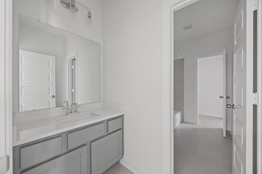 Furnished interior view inside a new home in Flora - 60', Hutto (Image 12).