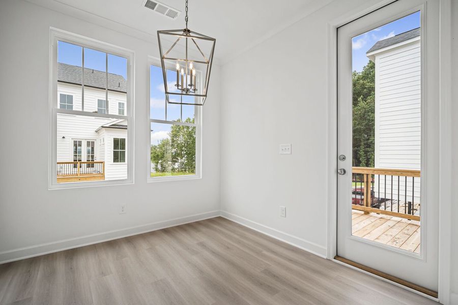 Spacious, unfurnished interior of a new home in The Village at River Green, Canton (Image 11).
