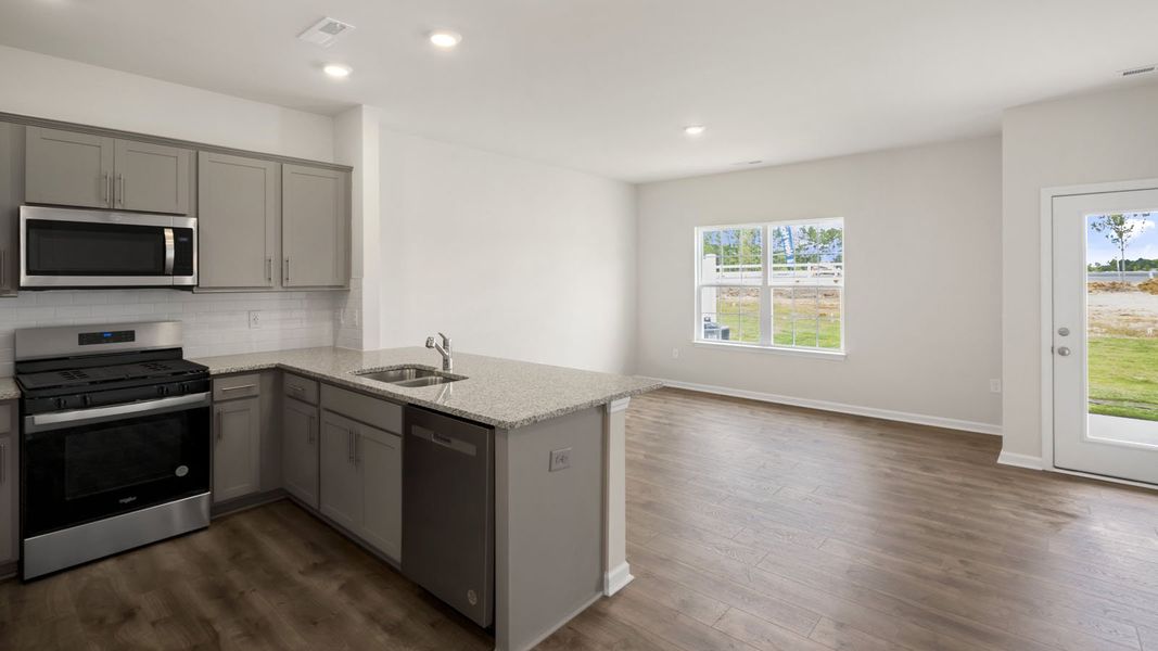 Furnished interior view inside a new home in Clock Road Townhomes, New Bern (Image 10).