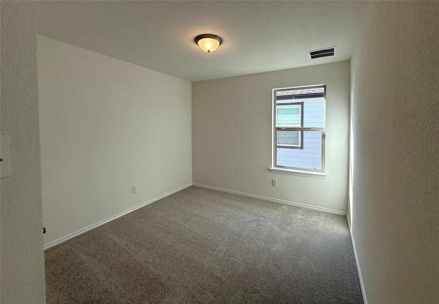 Spacious, unfurnished interior of a new home in River Bluff, Leander (Image 12).