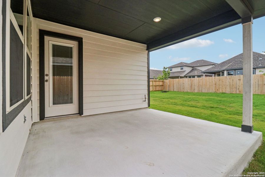 Front exterior of a new home in Kallison Ranch, San Antonio, TX, highlighting curb appeal (Image 28). Front exterior of a new home in Kallison Ranch, San Antonio, TX, highlighting curb appeal (Image 28).