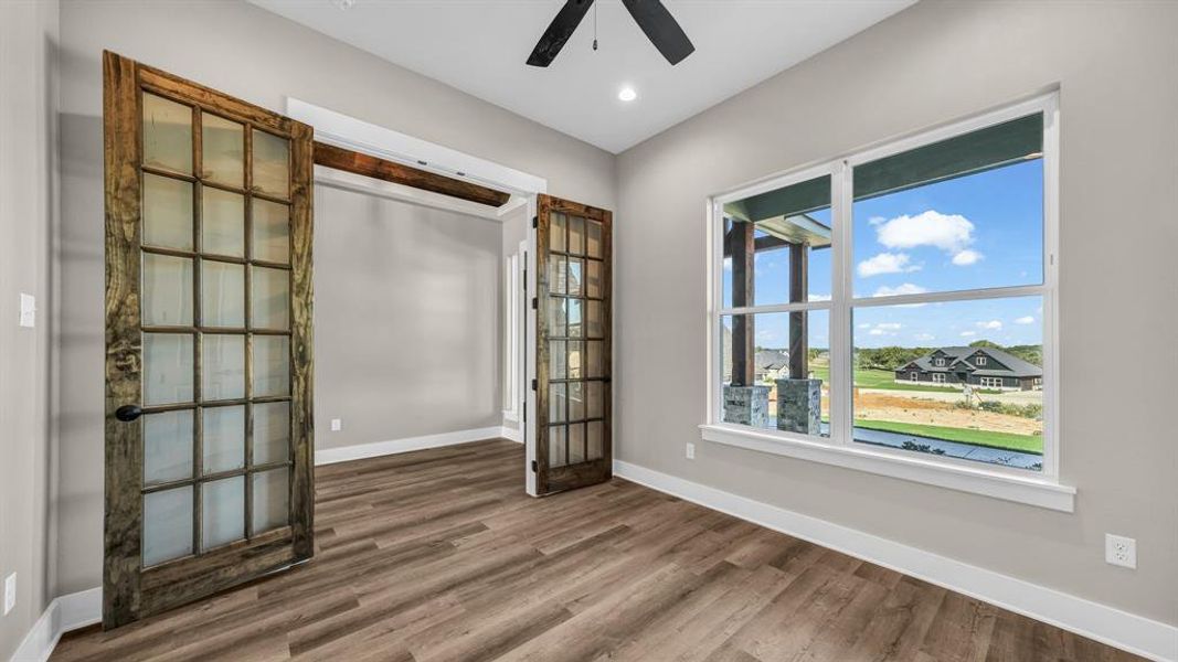 Bonus room with ceiling fan and LVP flooring