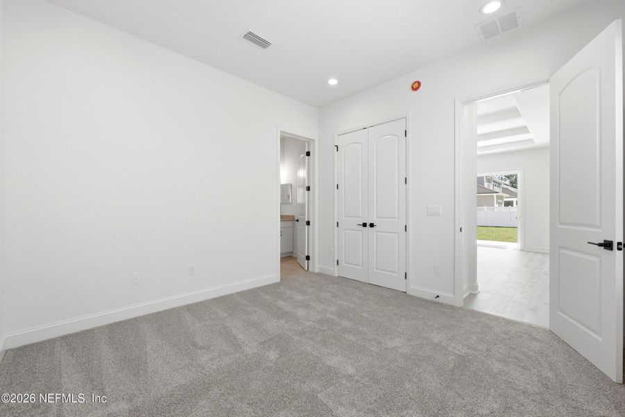 Spacious, unfurnished interior of a new home in Silver Landing At Silverleaf, St. Augustine (Image 22).