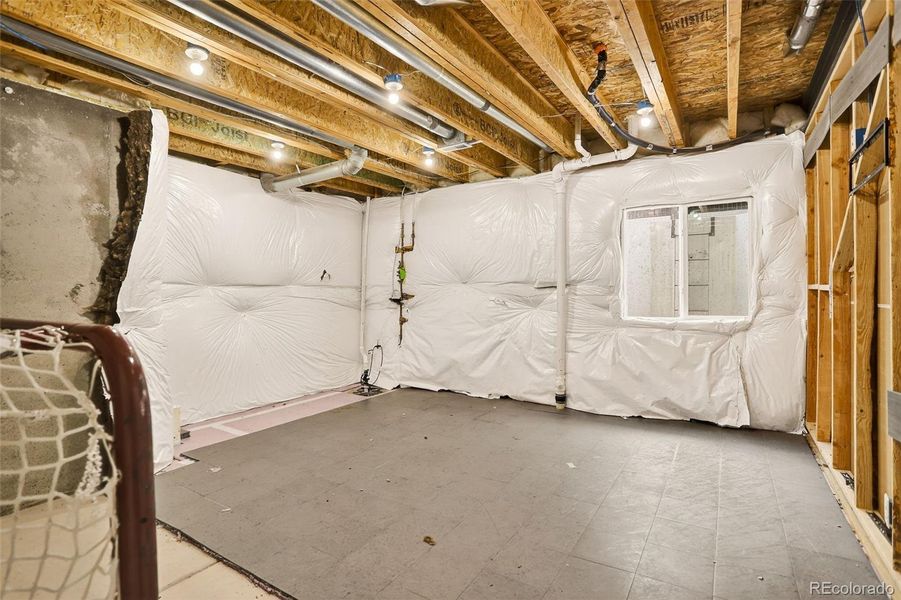 Additional storage space in unfinished area of basement Additional storage space in unfinished area of basement