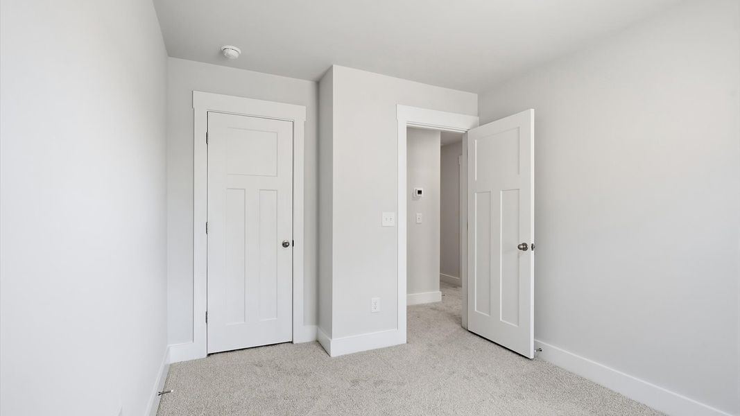 First-class secondary bedroom with comfortable carpeted flooring and generous closet space in Anderson, SC First-class secondary bedroom with comfortable carpeted flooring and generous closet space in Anderson, SC