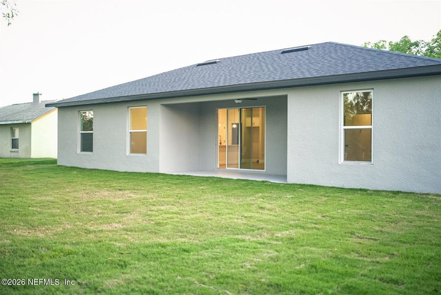 Exterior details and patio area of a home in , Palm Coast (Image 24).