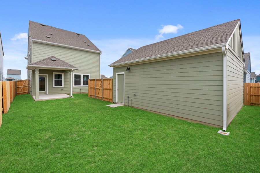 Rear of Home and Private Backyard