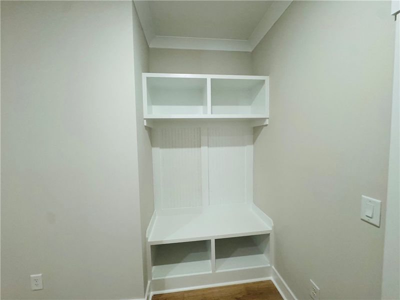 This convenient mud room offers practical built-in