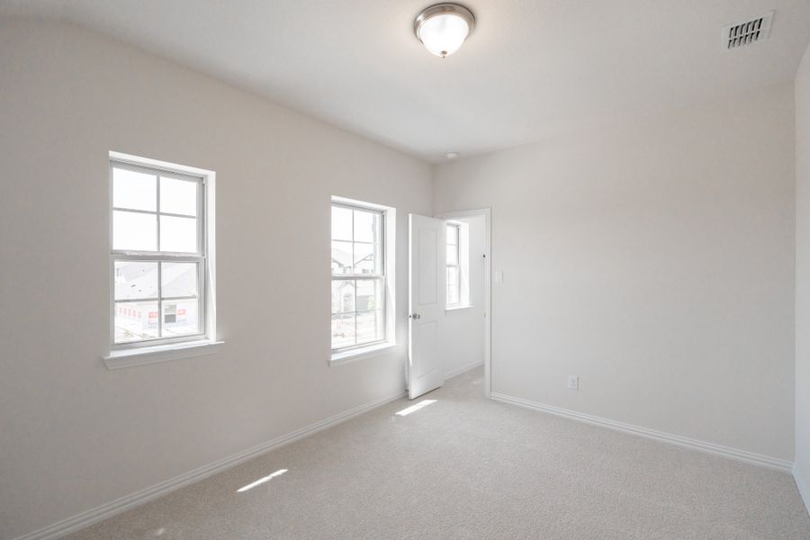 Spacious, unfurnished interior of a new home in Lake Pointe, Little Elm (Image 24).