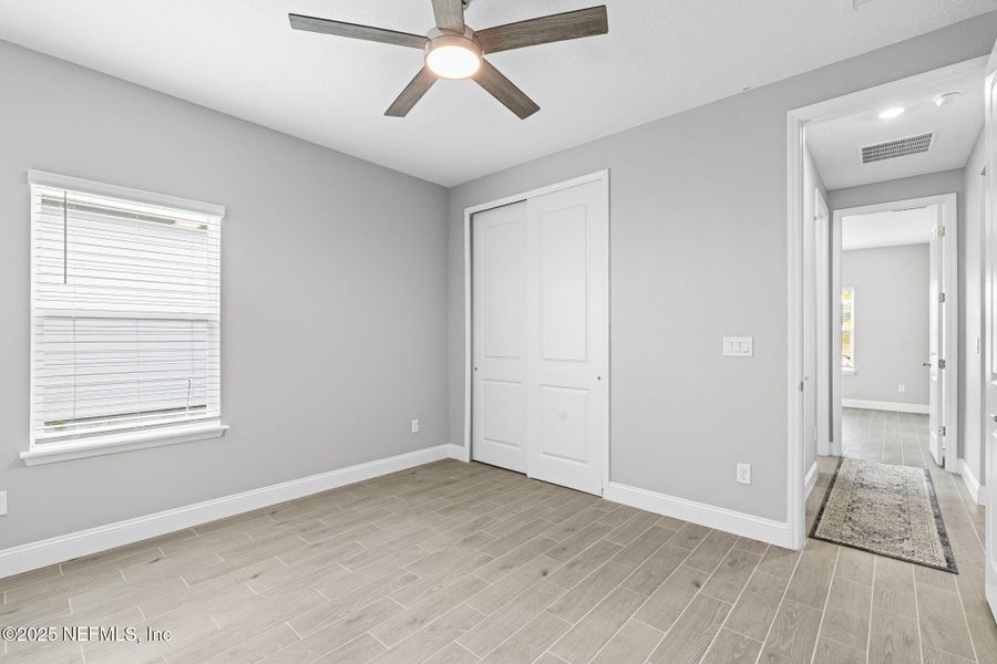 Spacious, unfurnished interior of a new home in Edenbrooke at Hyland Trail | 55+: Edenbrooke at Hyland Trail 60s, Green Cove Springs (Image 18). Spacious, unfurnished interior of a new home in Edenbrooke at Hyland Trail | 55+: Edenbrooke at Hyland Trail 60s, Green Cove Springs (Image 18).