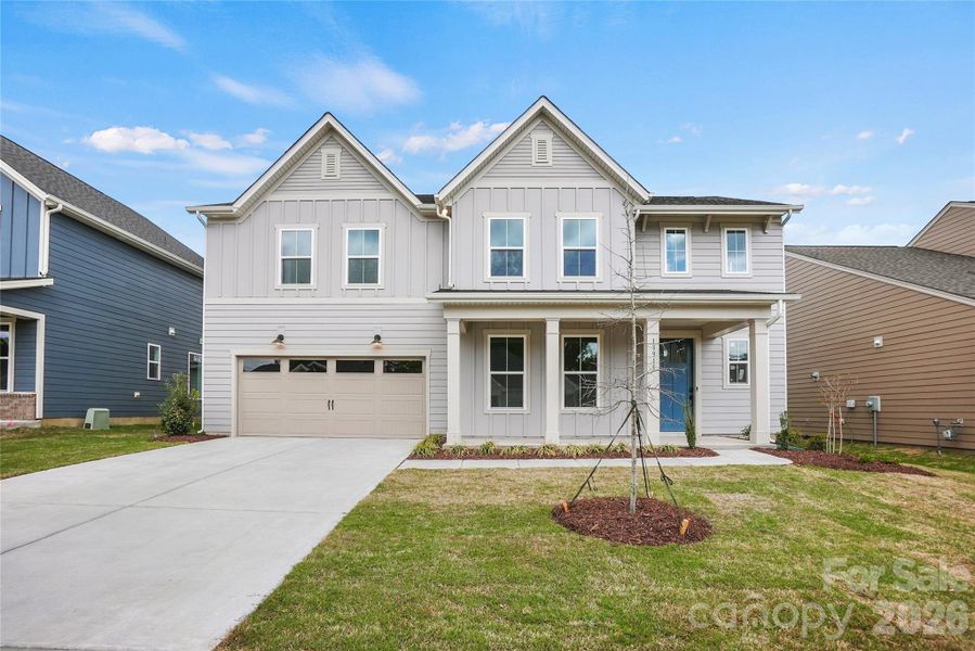 Front exterior of a new home in Parkside Crossing, Charlotte, NC, highlighting curb appeal (Image 27).