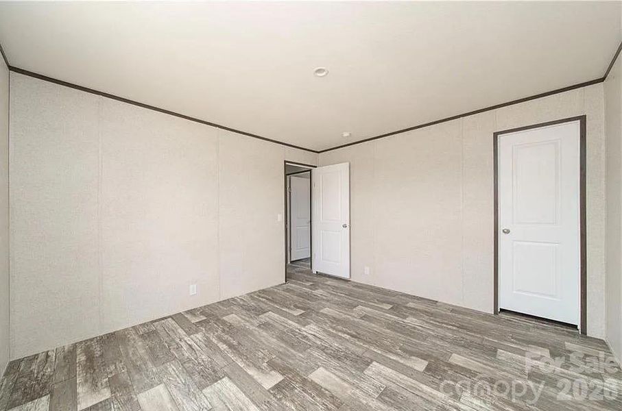 Spacious, unfurnished interior of a new home in , Lenoir (Image 21).