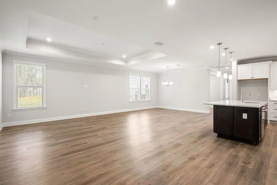 Spacious, unfurnished interior of a new home in Waterways, Richmond Hill (Image 57).