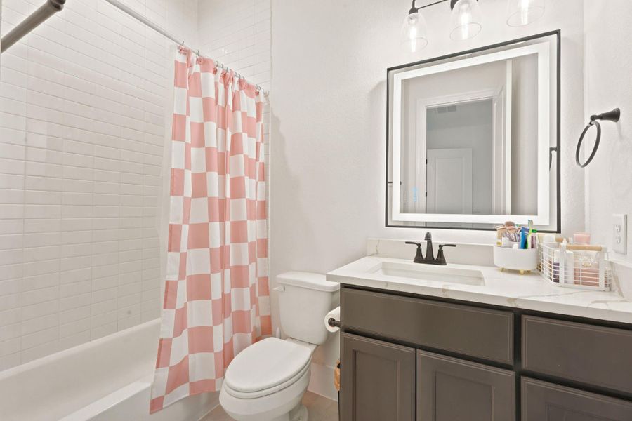 Furnished interior view inside a new home in , New Waverly (Image 25).