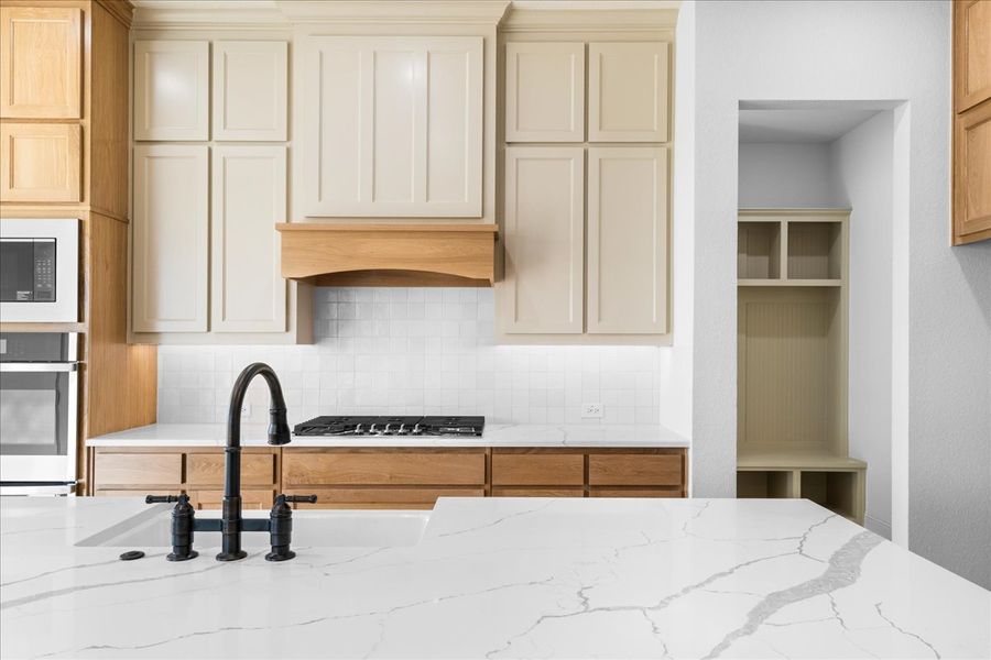 Representative furnished interior of a home built from the The Aylin by Doug Parr Custom Homes in Kessler Farms, Brock (Image 11).