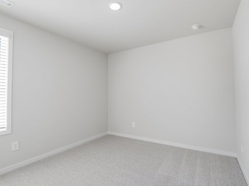 Spacious, unfurnished interior of a new home in Country Lane - Classic Series, Clayton (Image 17).