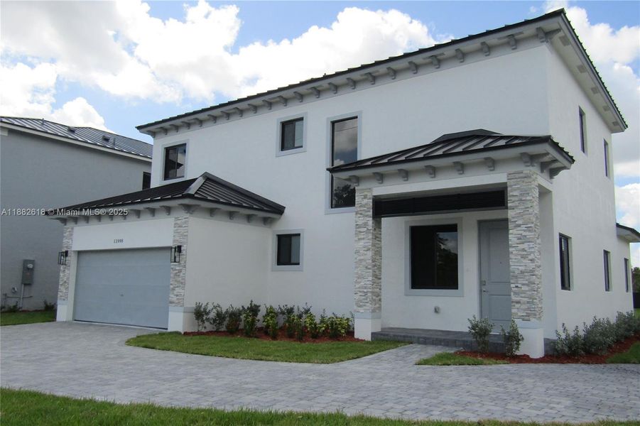 Front exterior of a new home in , Miami, FL, highlighting curb appeal (Image 20). Front exterior of a new home in , Miami, FL, highlighting curb appeal (Image 20).