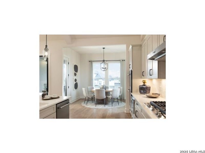 Furnished interior view inside a new home in Highland Estates, San Antonio (Image 9).