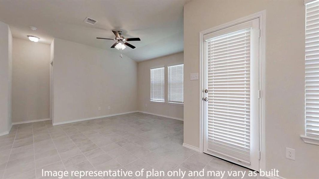 Empty room featuring ceiling fan and light tile patterned floors Empty room featuring ceiling fan and light tile patterned floors