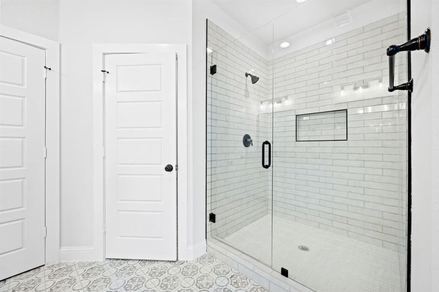 Bathroom featuring an enclosed shower