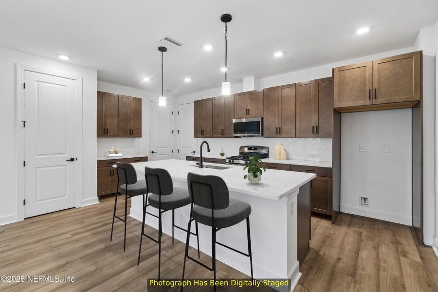 Furnished interior view inside a new home in Westerly Park at Wildlight - Courtyard Collection, Yulee (Image 6).