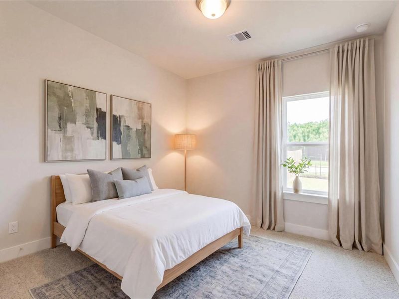 Furnished interior view inside a new home in Sunterra, Katy (Image 9).