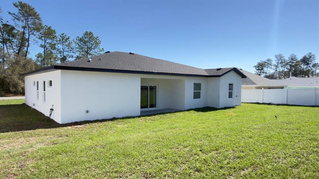 Exterior details and patio area of a home in , Ocala (Image 24).