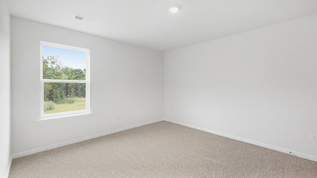 Spacious, unfurnished interior of a new home in Durbin Meadows Traditions, Fountain Inn (Image 27).