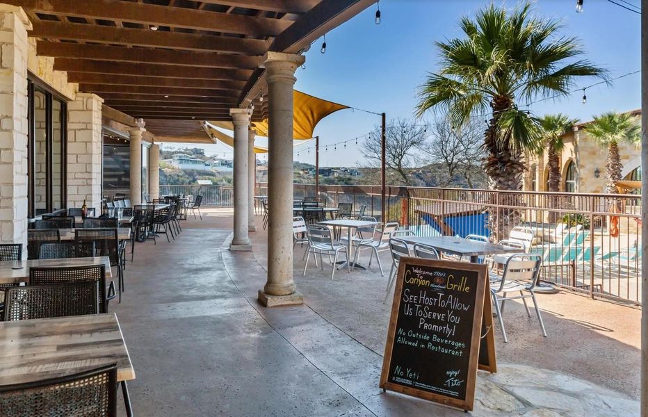 Front exterior of a new home in Las Brisas Estates, Lakeway, TX, highlighting curb appeal (Image 15). Front exterior of a new home in Las Brisas Estates, Lakeway, TX, highlighting curb appeal (Image 15).