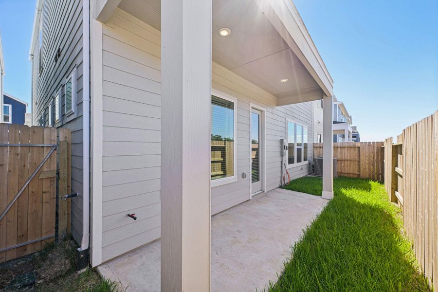 Exterior details and patio area of a home in Kemah Crossing - Luxe Series, Kemah (Image 4). Exterior details and patio area of a home in Kemah Crossing - Luxe Series, Kemah (Image 4).