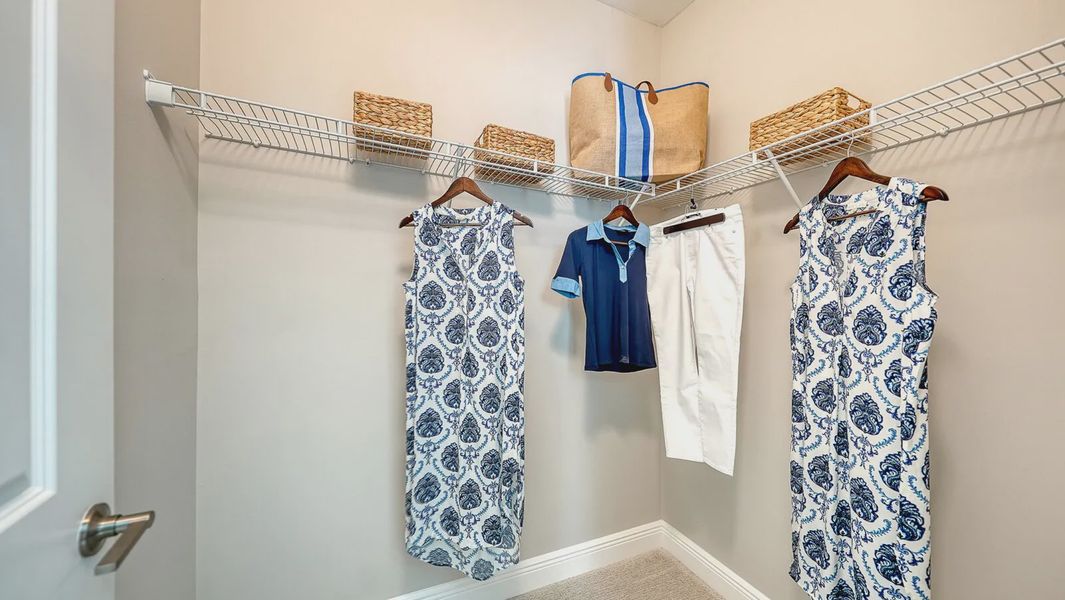 Representative furnished interior of a home built from the Avery by Neal Communities in SkySail, Naples (Image 12).