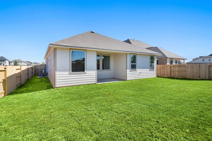 This backyard is perfect for family gatherings, social events, or simply unwinding in the fresh air. This backyard is perfect for family gatherings, social events, or simply unwinding in the fresh air.