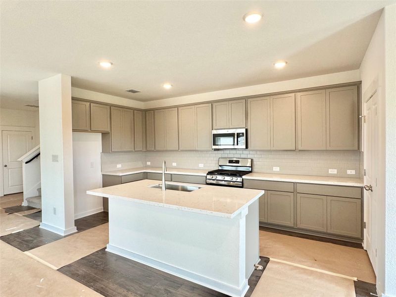 Furnished interior view inside a new home in Carillon, Manor (Image 8).