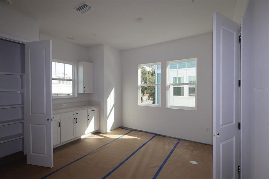 In-progress construction of a new home in Towns at Union, St. Petersburg, FL (Image 15).