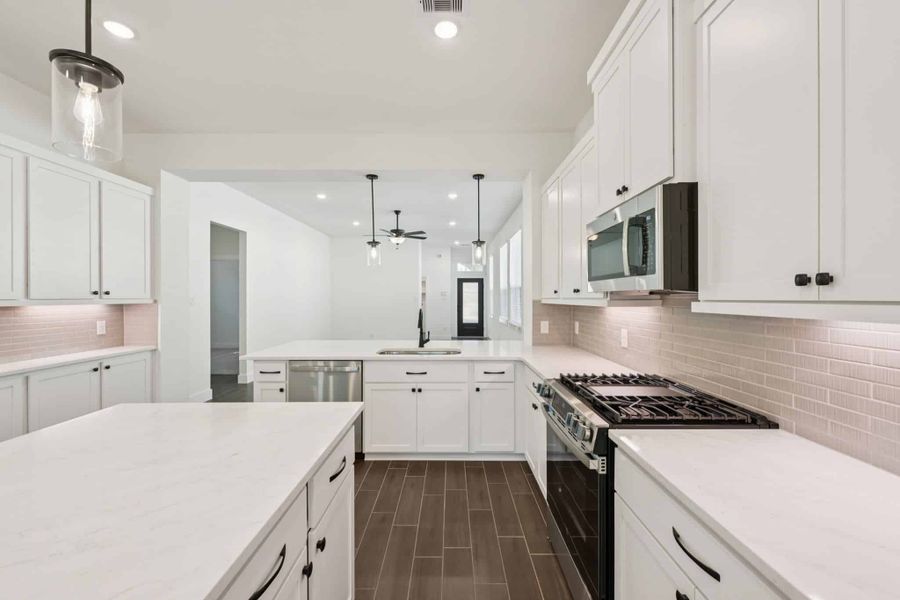 Furnished interior view inside a new home in The Woodlands Hills, Willis (Image 6).