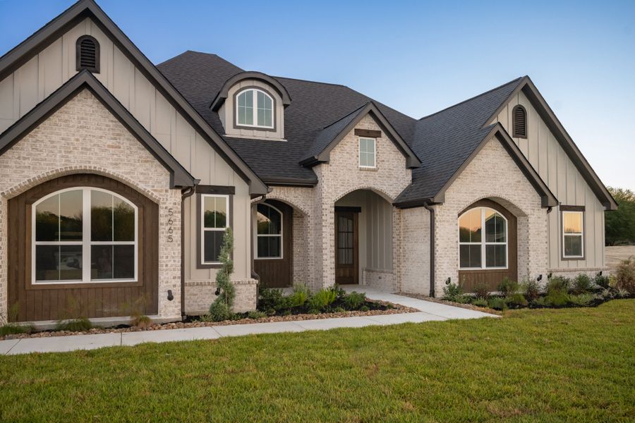 Representative exterior photo of a completed home built from the The Sophie by Reece Homes in Traditions, Bryan, TX (Image 34).