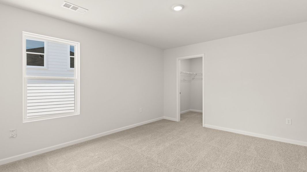 Representative unfurnished interior of a home built from the Mansfield by D.R. Horton in Falcon Landing, Gainesville (Image 27).