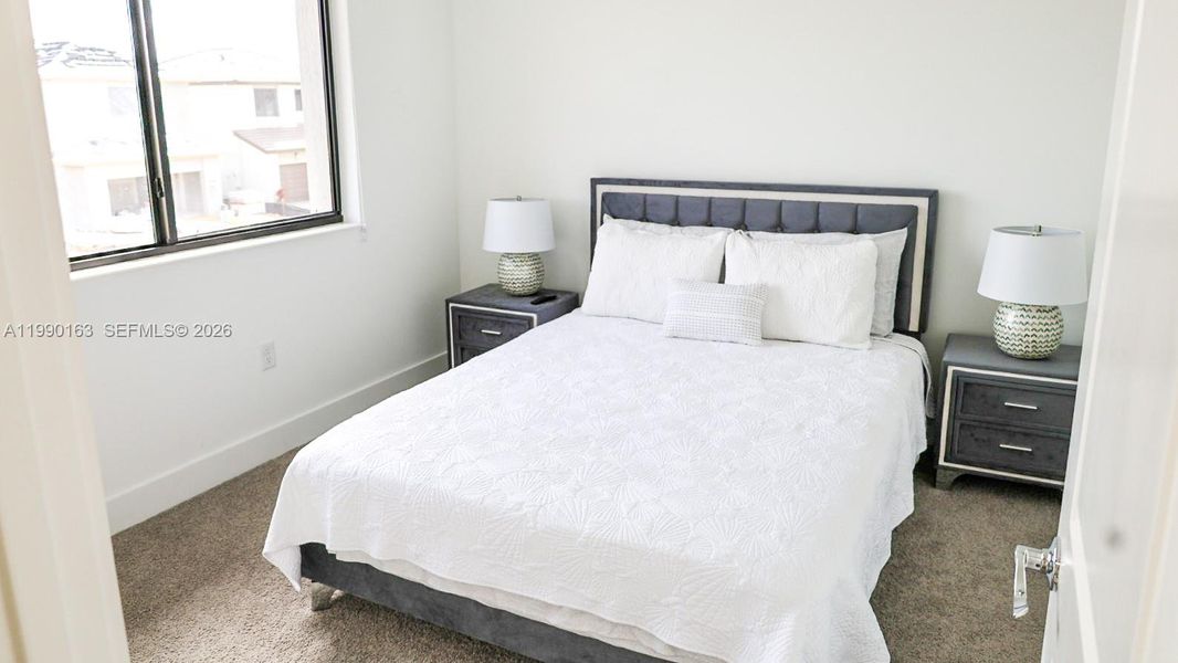 Furnished interior view inside a new home in , Ave Maria (Image 7).