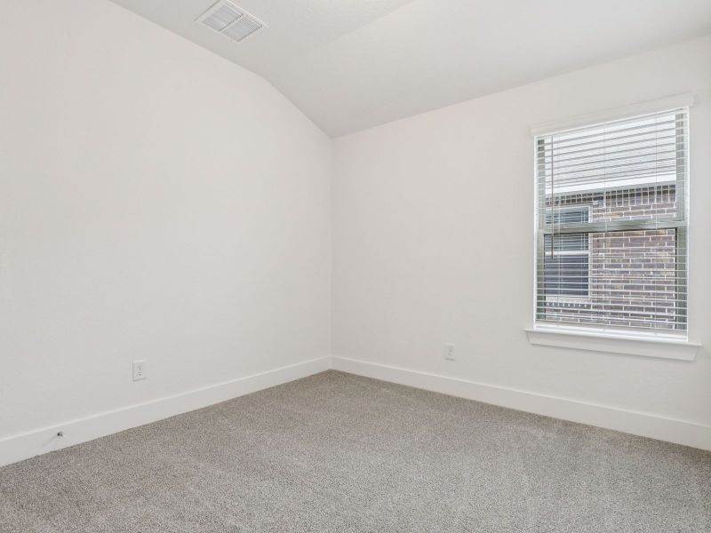 Living room in the Callaghan floorplan at a Meritage Homes community.