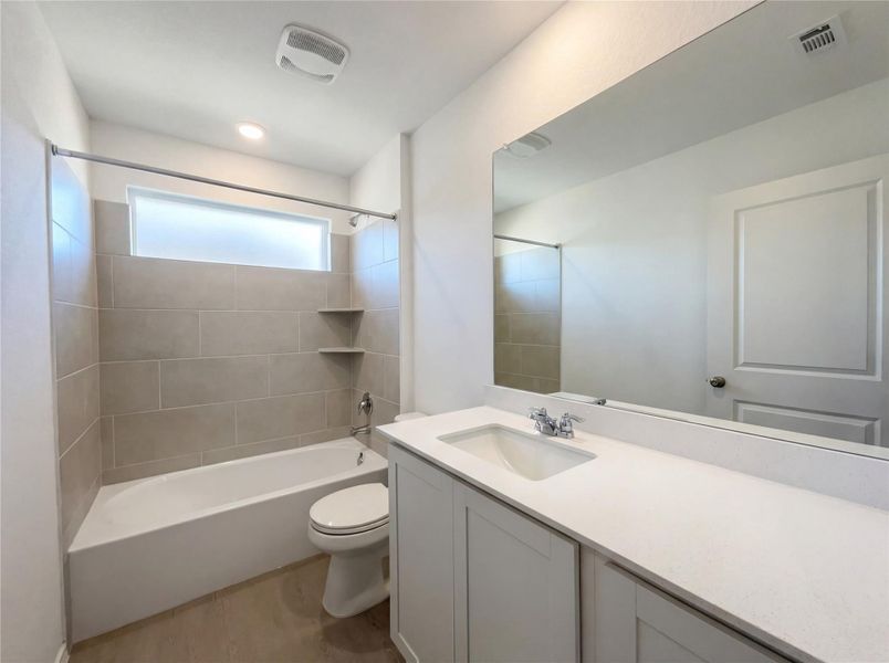 Furnished interior view inside a new home in The Colony, Bastrop (Image 12).
