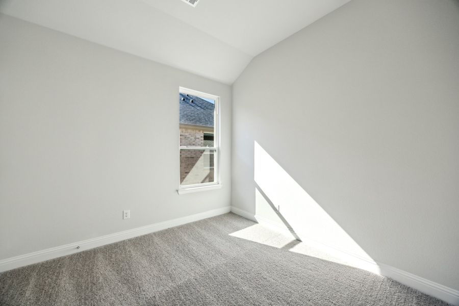 Representative unfurnished interior of a home built from the Waverly III by Megatel Homes in Bellagio, Forney (Image 15).