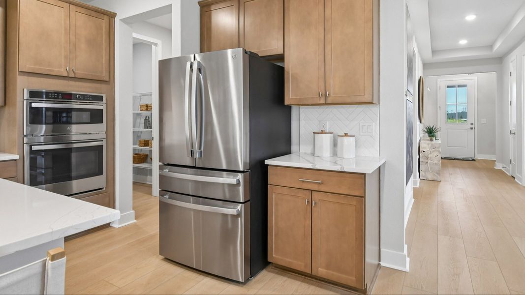 Kitchen in the Marigold Floor Plan at Haven at Diamond Springs