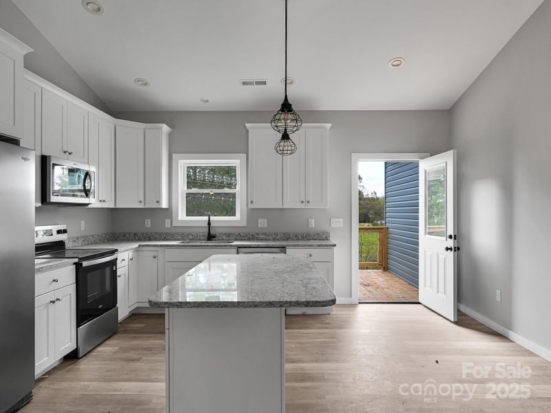 Furnished interior view inside a new home in , Weaverville (Image 4).