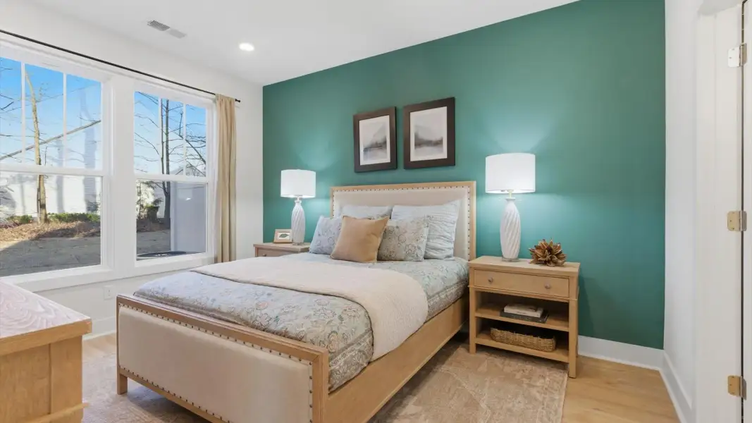 Highly skilled design shines in this elegant, restful primary suite located in Greenville, SC