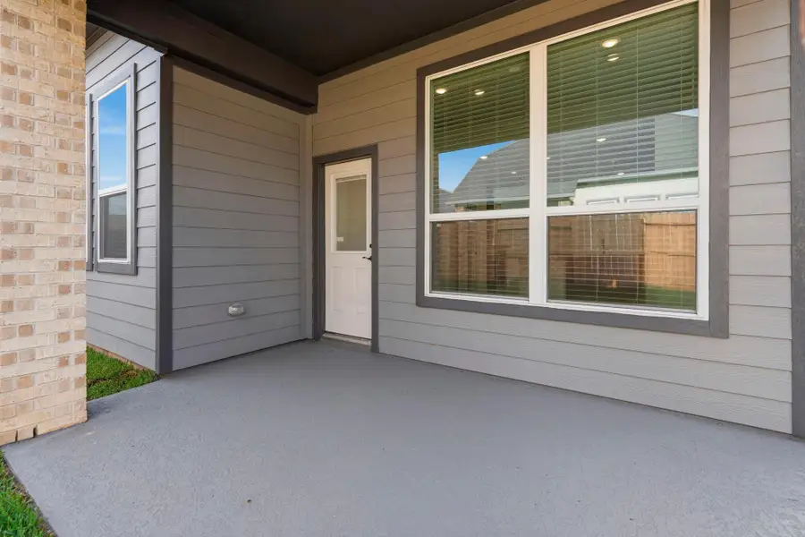 Exterior details and patio area of a home in Emory Glen, Magnolia (Image 3).