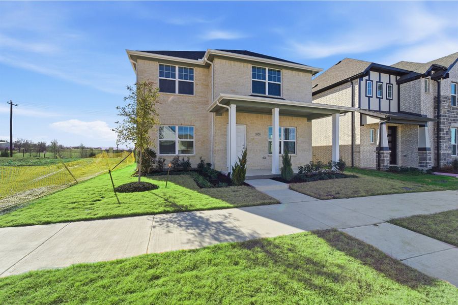 Front exterior of a new home in La Terra, Celina, TX, highlighting curb appeal (Image 2).