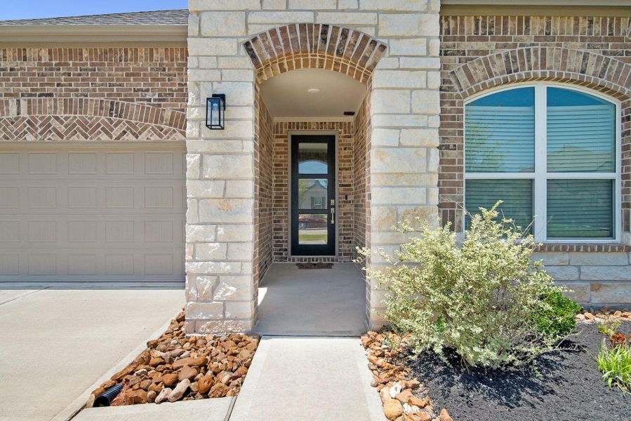 As soon as you enter, the expansive high ceilings and the inviting 7-foot wide plank flooring that spans the home immediately captivate you.
