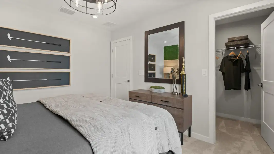 Golf themed bedroom overlooking the course New Construction Home in Winter Haven by DRB Homes in Willowbrook North Golf themed bedroom overlooking the course New Construction Home in Winter Haven by DRB Homes in Willowbrook North