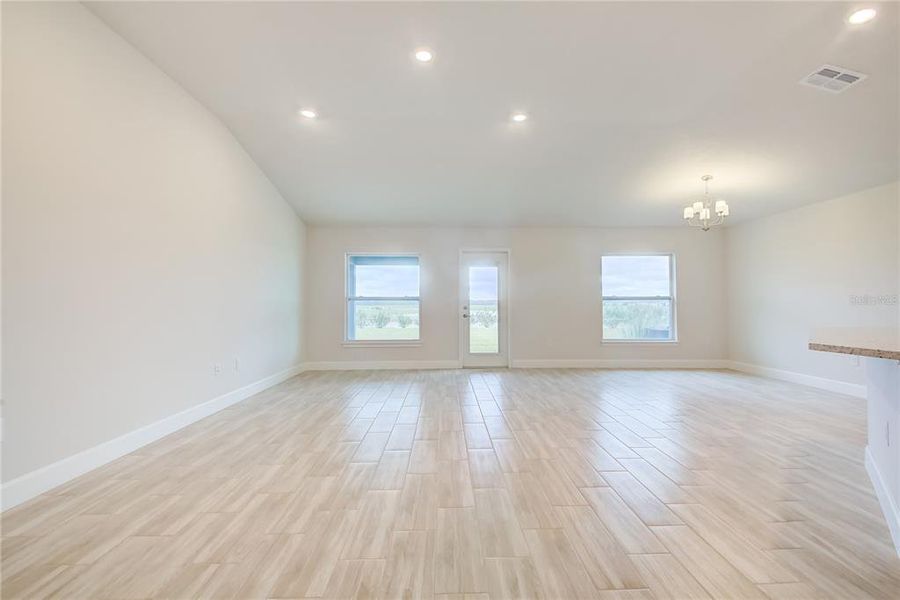 Spacious, unfurnished interior of a new home in Aviary at Rutland Ranch, Parrish (Image 17).