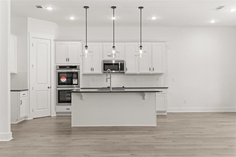 Furnished interior view inside a new home in Traditions of Braselton, Jefferson (Image 12).